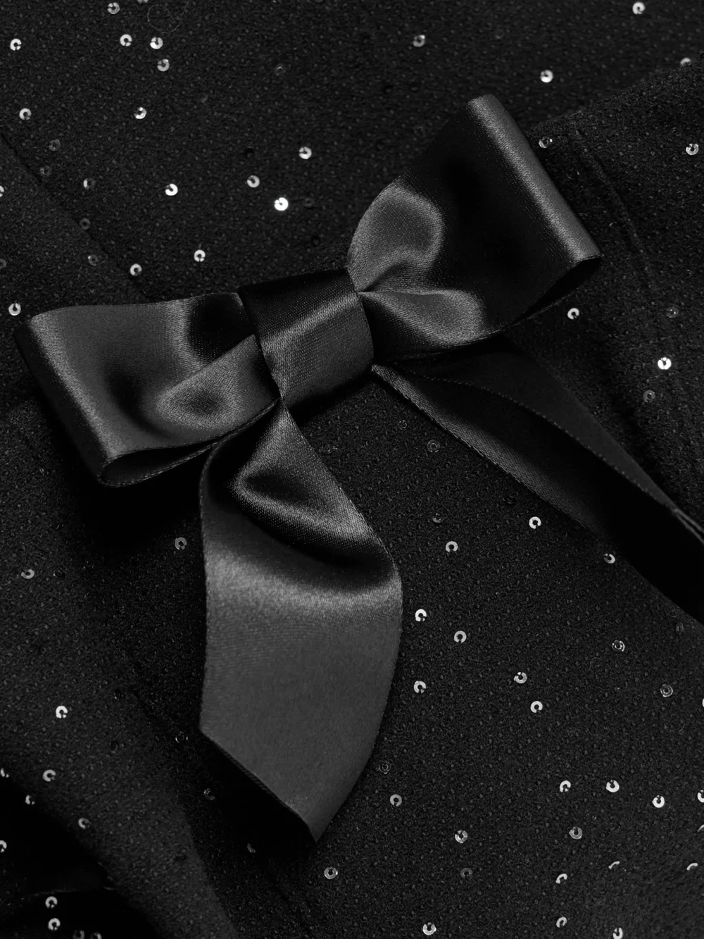 Close-up detail of the Shushu/Tong Strapless Bow-detailed Sequin-embellished Wool-blend Mini Dress