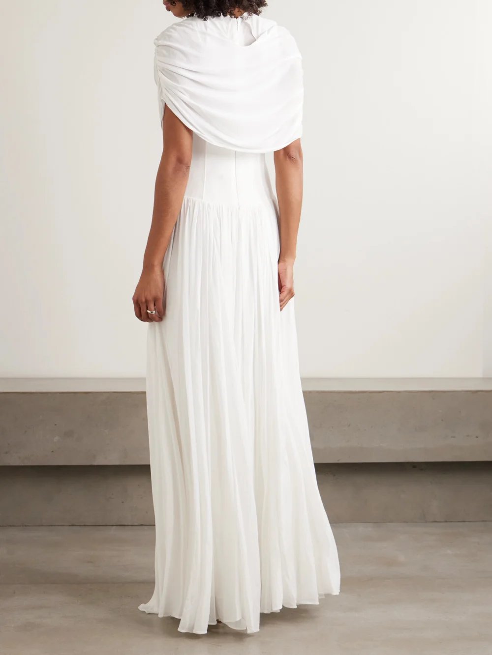 Back view of the Simkhai Nancie Cape-effect Draped Pleated Jersey Maxi Dress