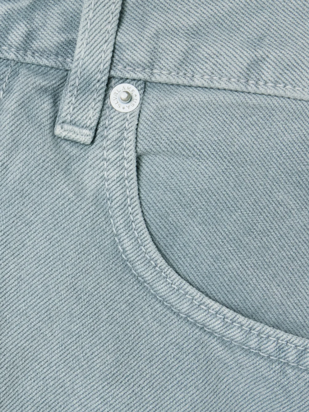 Close-up detail of the Slvrlake Frayed Denim Maxi Skirt