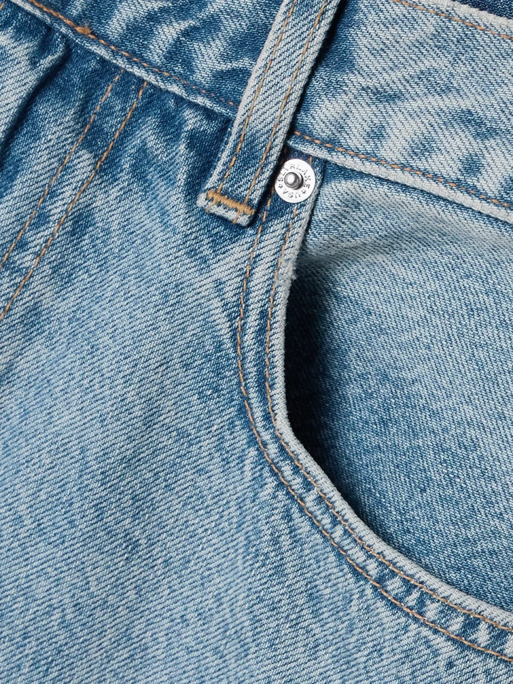 Close-up detail of the Slvrlake Frayed Paneled Denim Mini Skirt