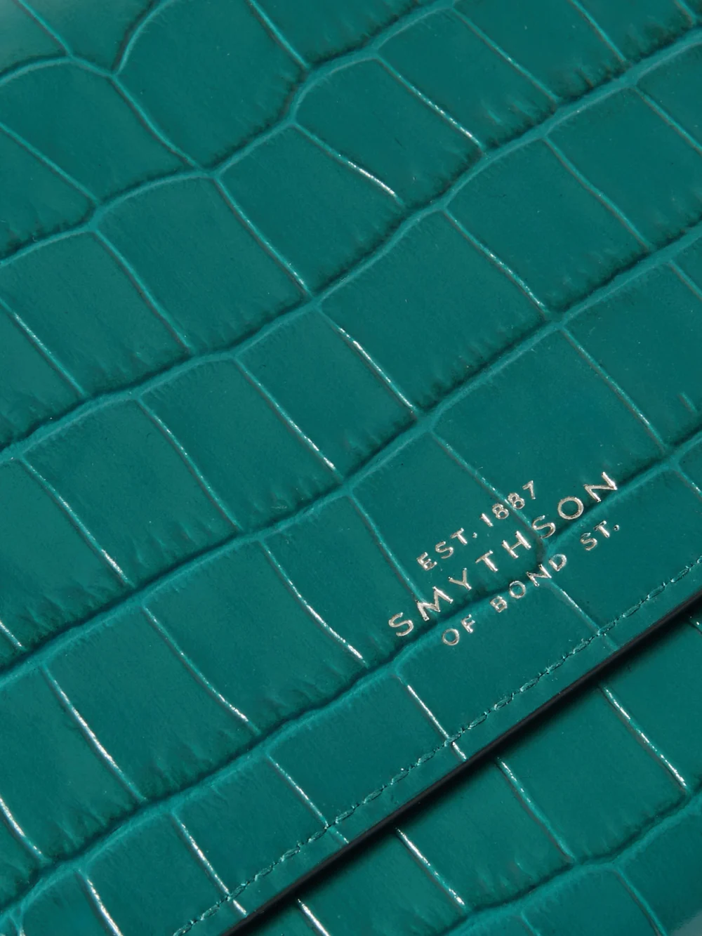 Close-up detail of the Smythson Marshall Croc-effect Leather Travel Wallet