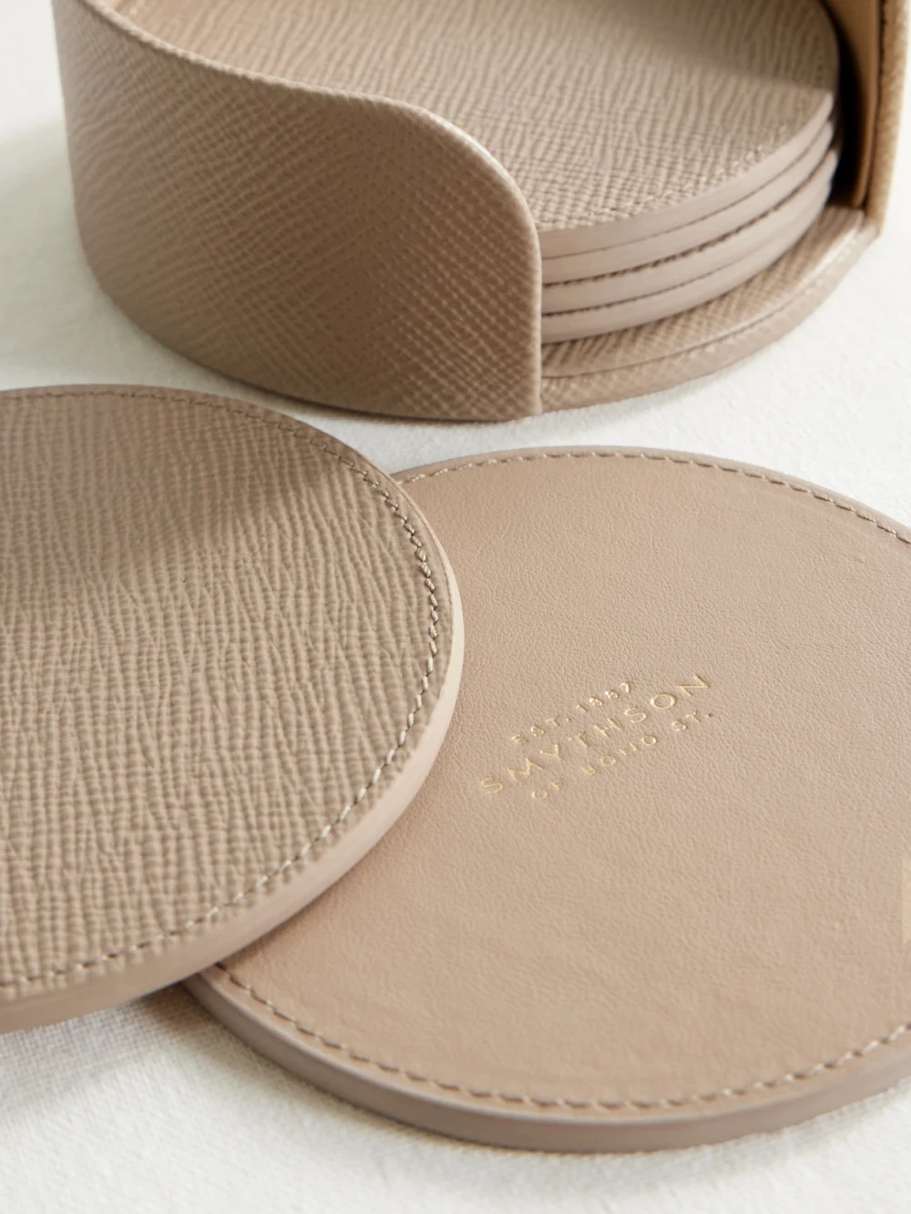 Close-up detail of the Smythson Set of Six Panama Textured-leather Coasters
