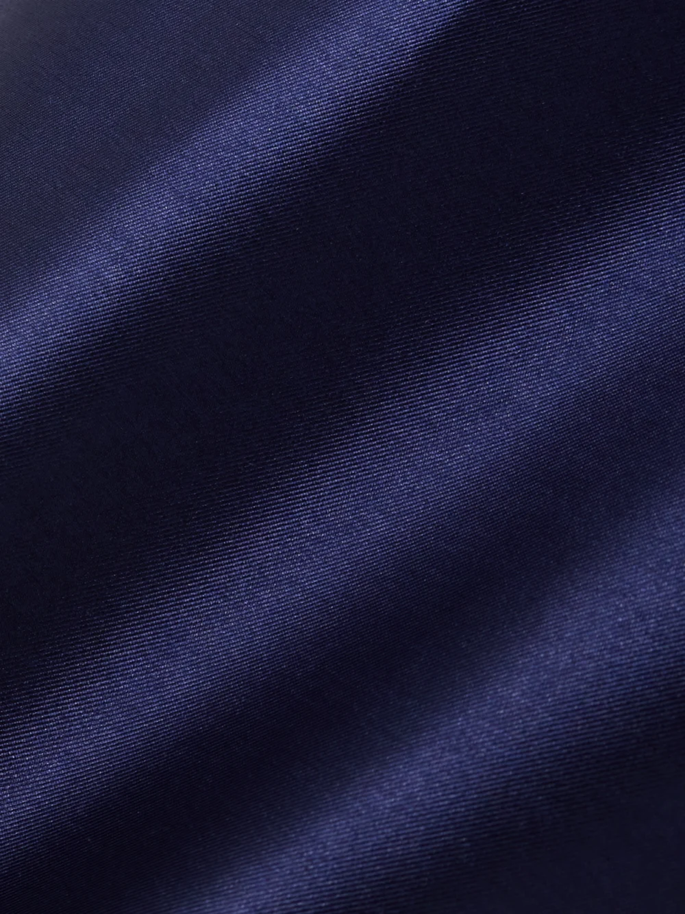 Close-up detail of the Solace London Imani Strapless Pleated Twill Gown