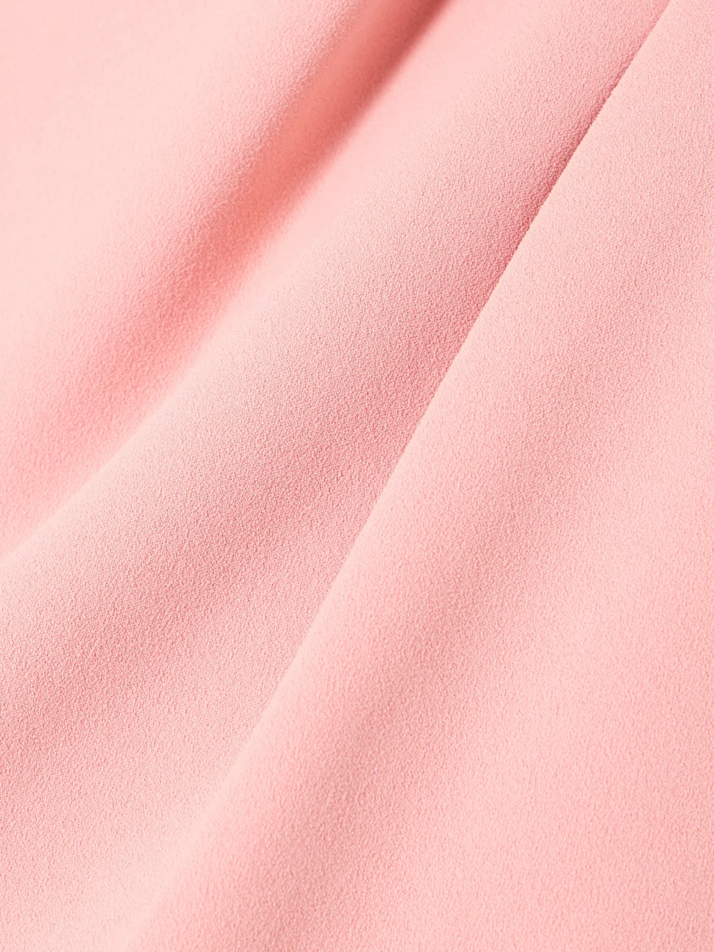 Close-up detail of the Solace London Irina Tie-detailed One-shoulder Crepe Gown