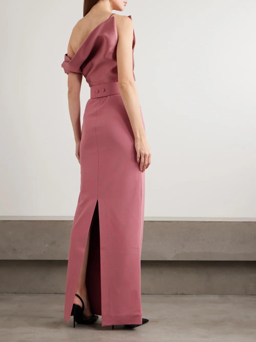 Back view of the Solace London Magda Off-the-shoulder Belted Draped Faille and Crepe Gown