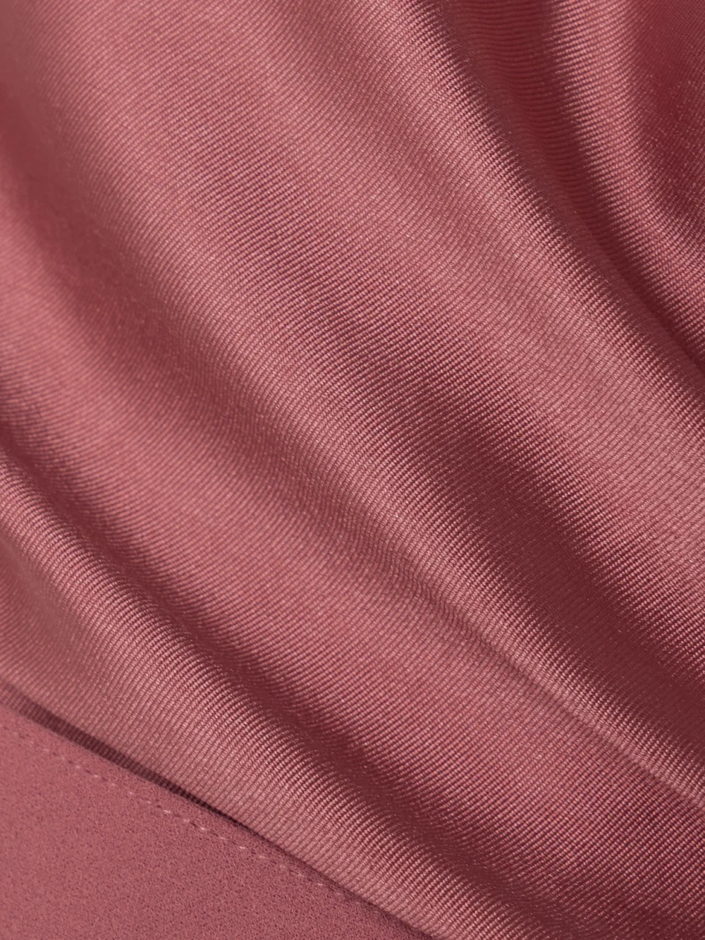 Close-up detail of the Solace London Magda Off-the-shoulder Belted Draped Faille and Crepe Gown