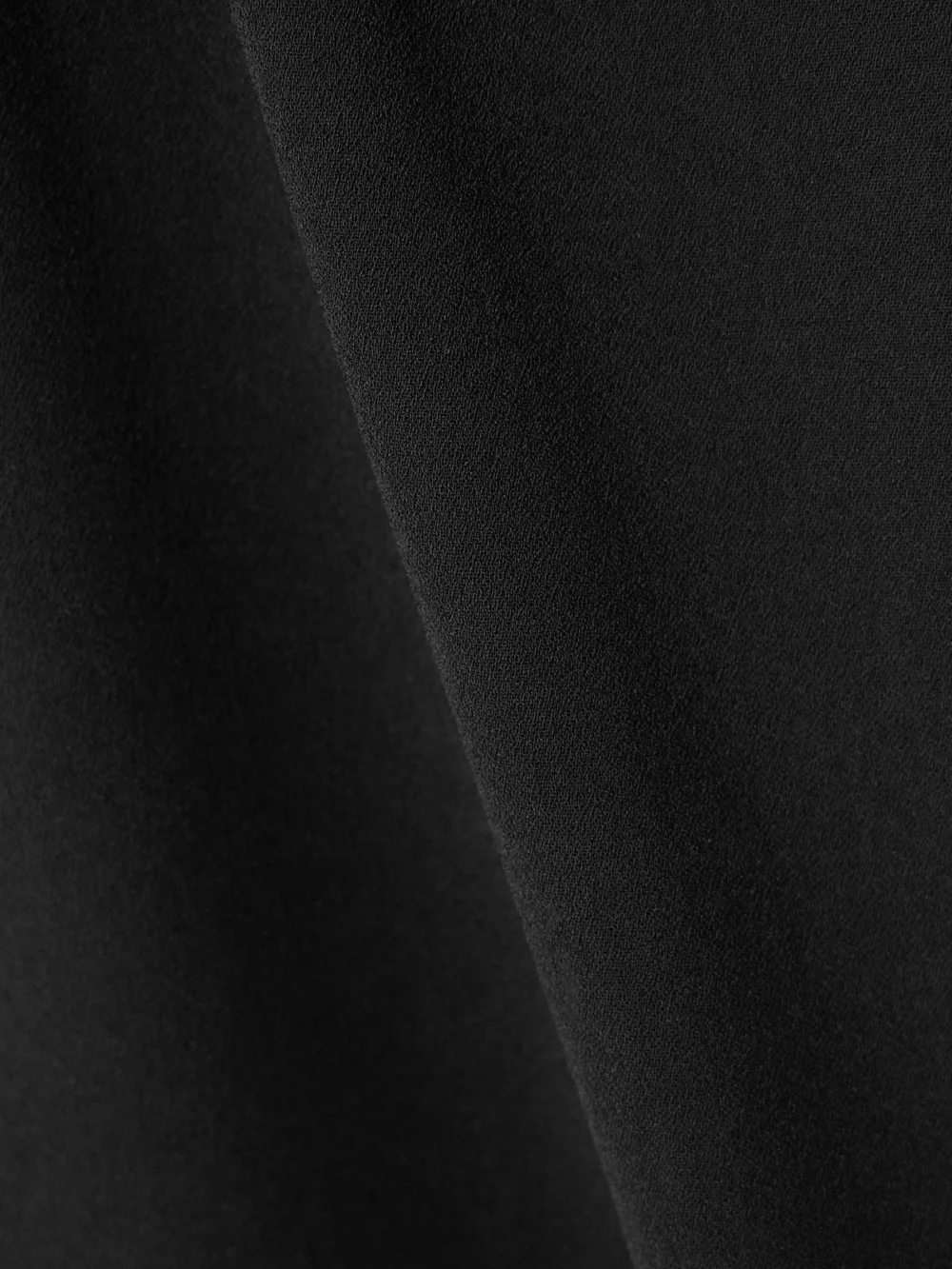Close-up detail of the Solace London Milly Cutout Crepe Gown