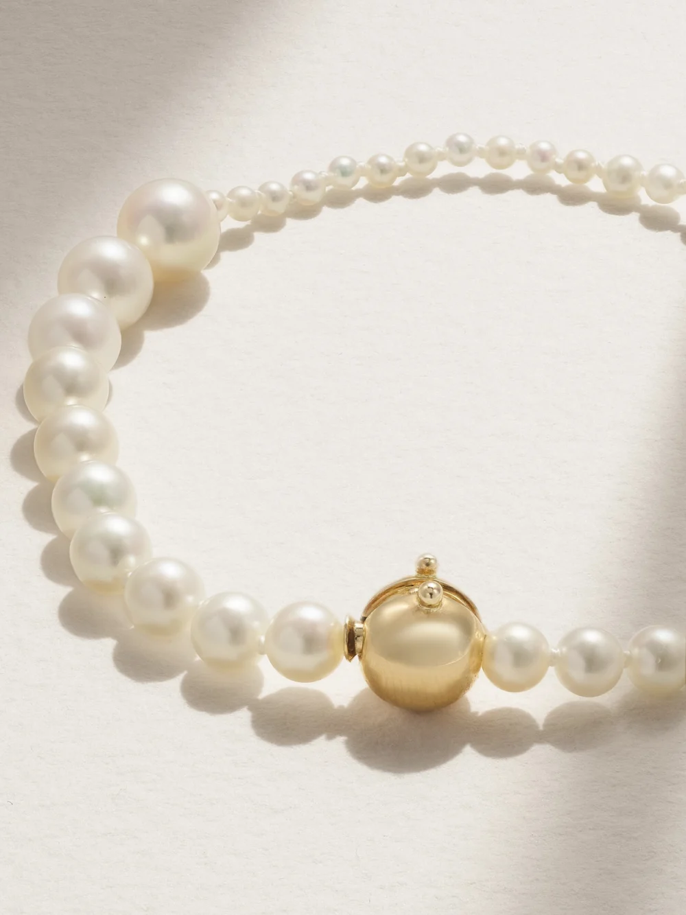 Close-up detail of the Sophie Bille Brahe Petite Peggy 14-karat Gold Pearl Bracelet