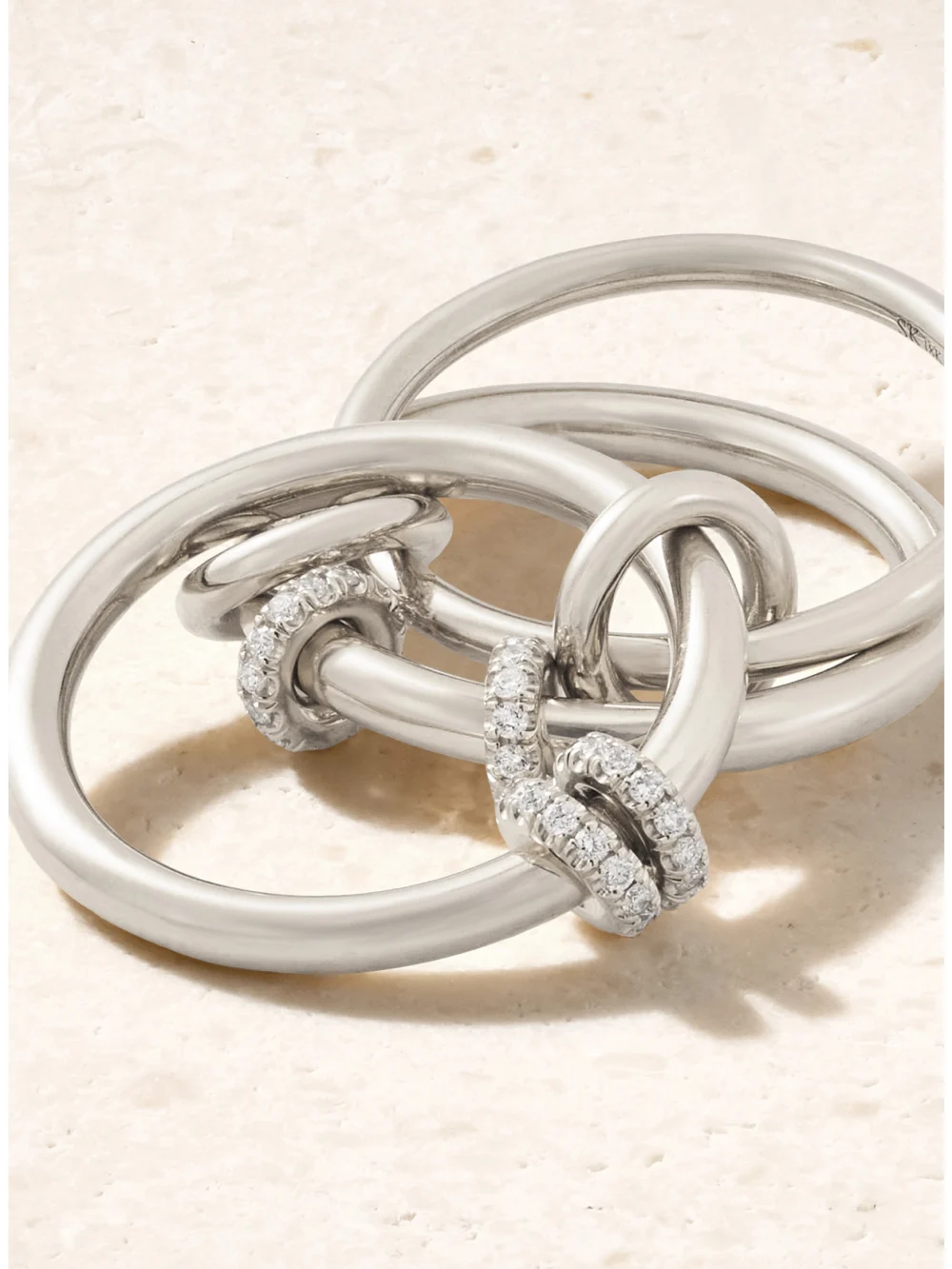 Close-up detail of the Spinelli Kilcollin Jovie Set of Three Sterling Silver Diamond Rings