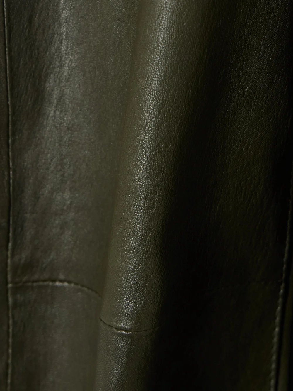 Close-up detail of the Sprwmn Leather Flared Pants