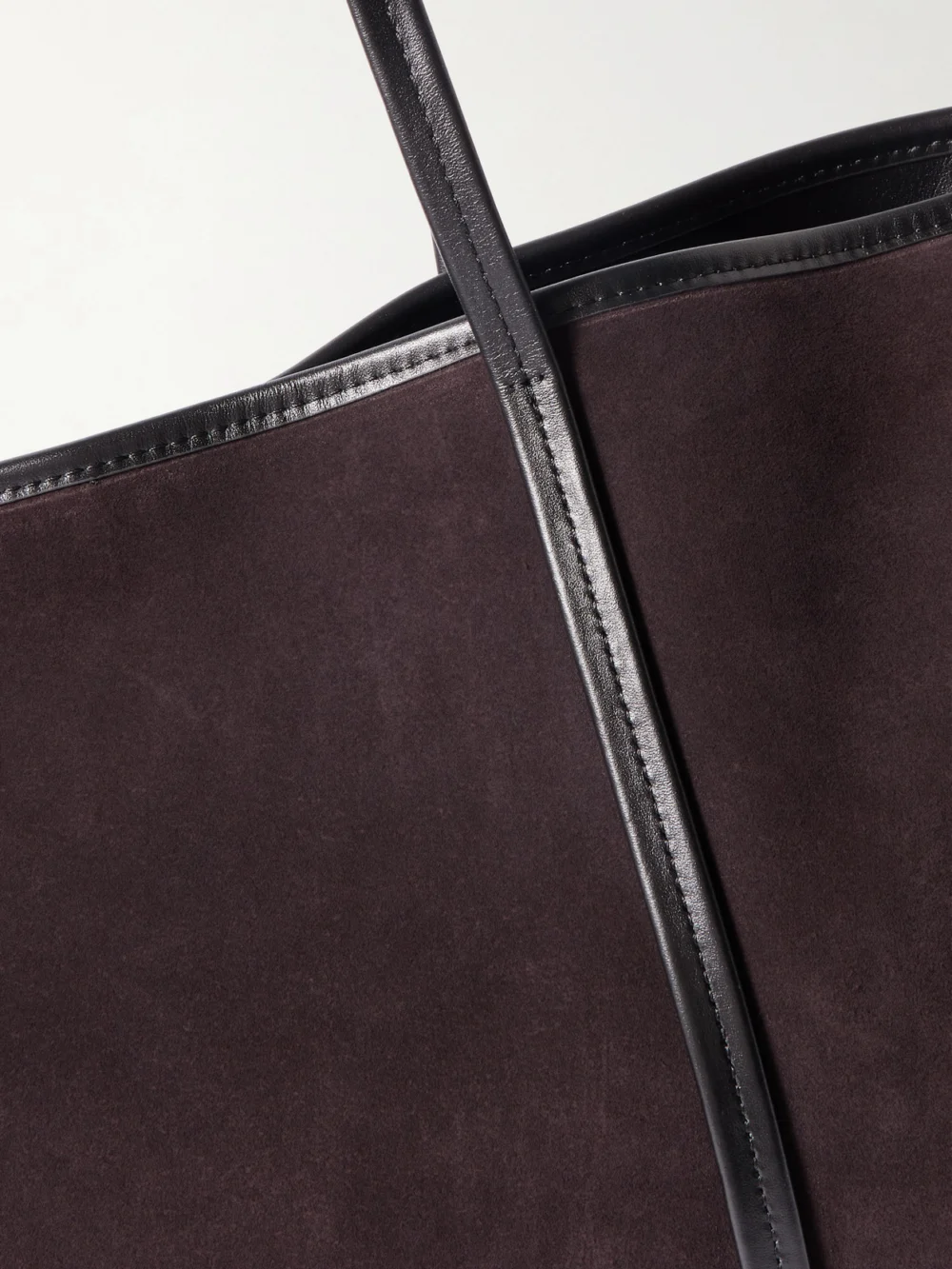 Close-up detail of the St. Agni Bateau Leather-trimmed Suede Tote