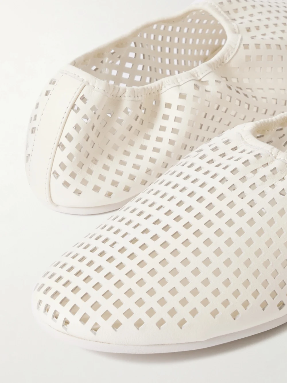 Close-up detail of the St. Agni Perforated Leather Ballet Flats