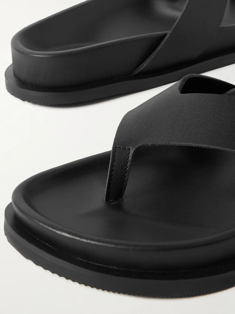 Close-up detail of the St. Agni Thong Leather Flip Flops