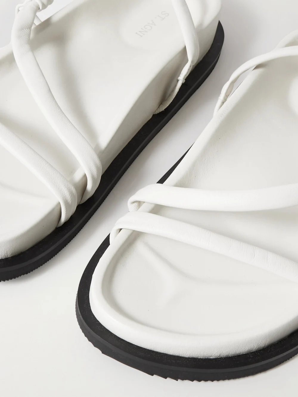Close-up detail of the St. Agni Twist Leather Slingback Sandals