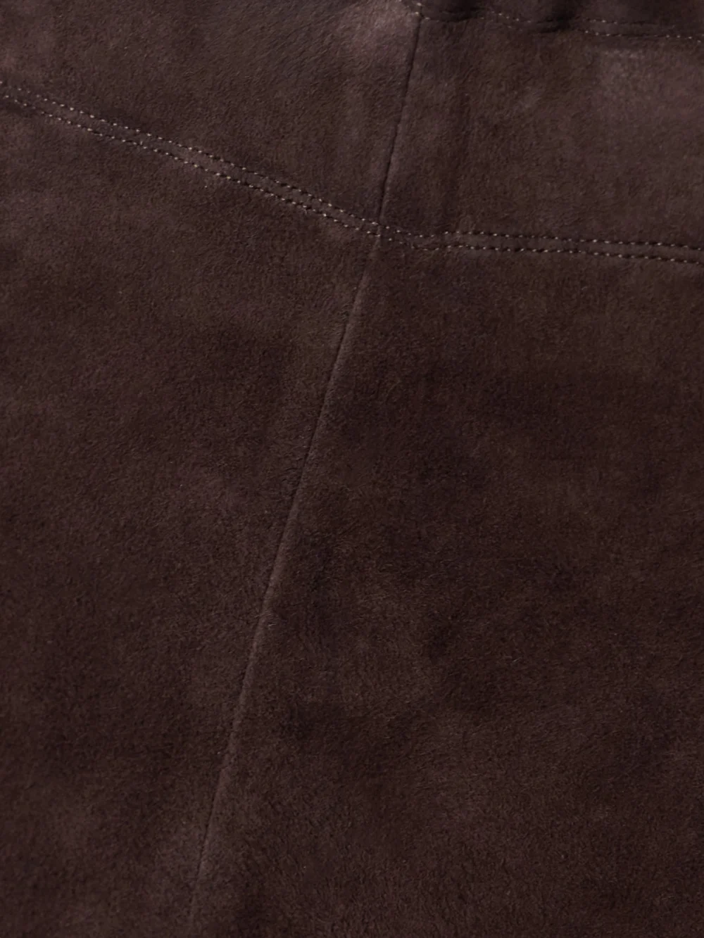 Close-up detail of the Stouls Jp Twenty Cropped Suede Flared Leggings