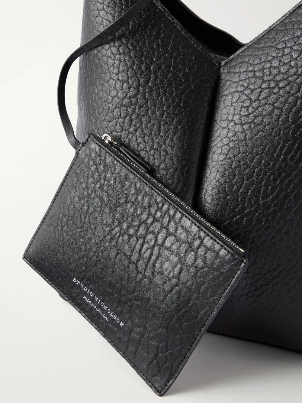 Close-up detail of the Studio Nicholson Hoho Leather Tote
