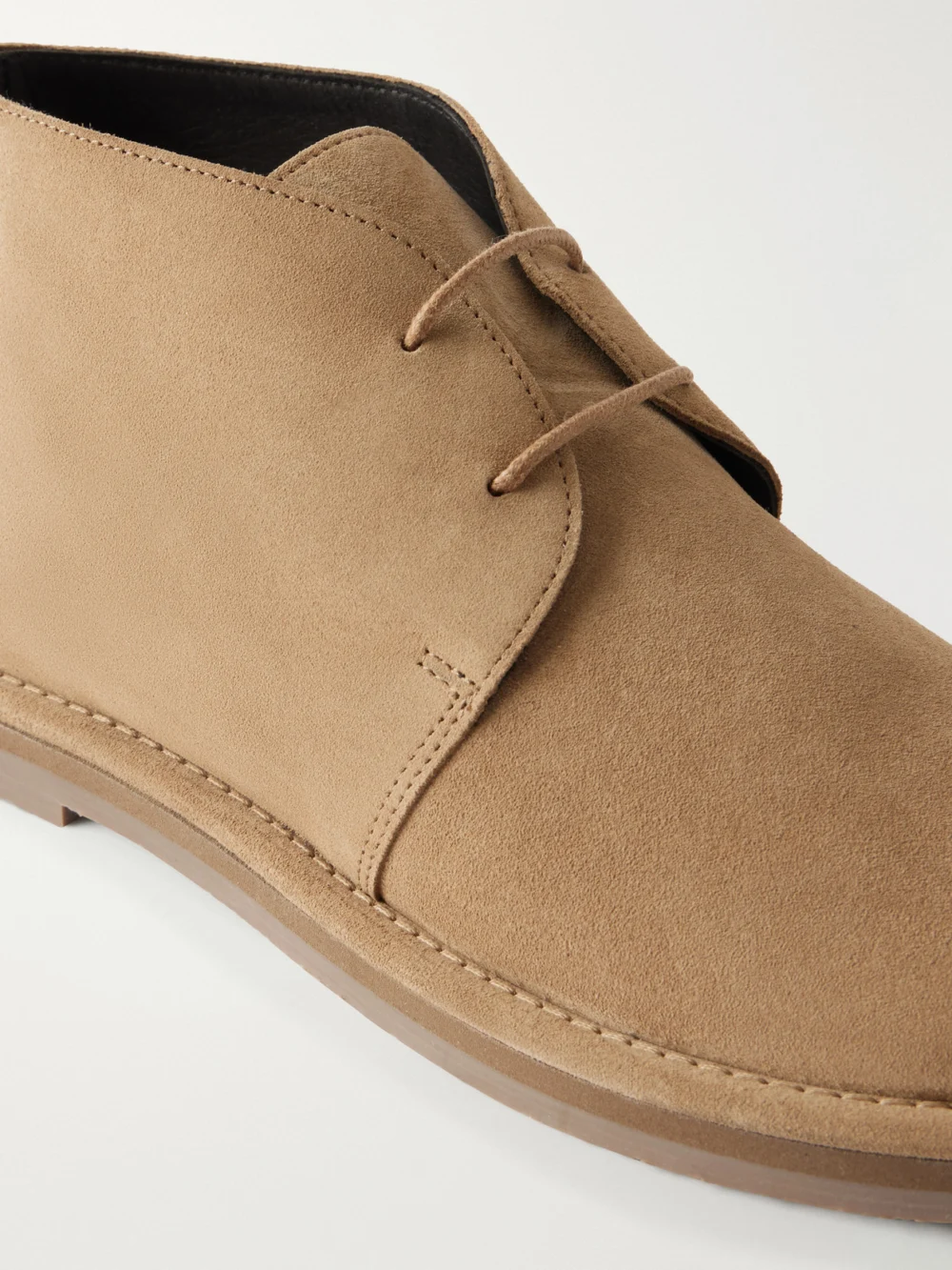 Close-up detail of the Studio Nicholson Woodrow Suede Ankle Boots