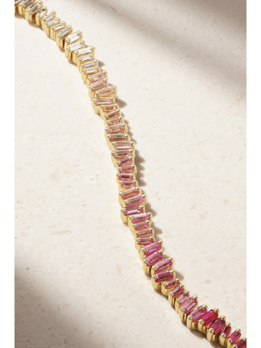 Close-up detail of the Suzanne Kalan 18-karat Gold, Sapphire and Diamond Tennis Bracelet