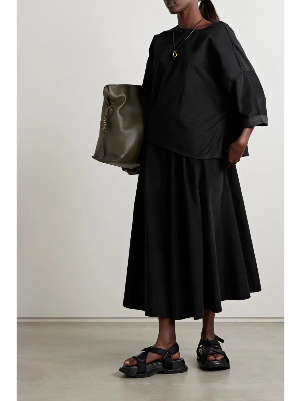 Suzie Kondi The Kyria Pleated Cotton-corduroy Midi Skirt, worn by a model