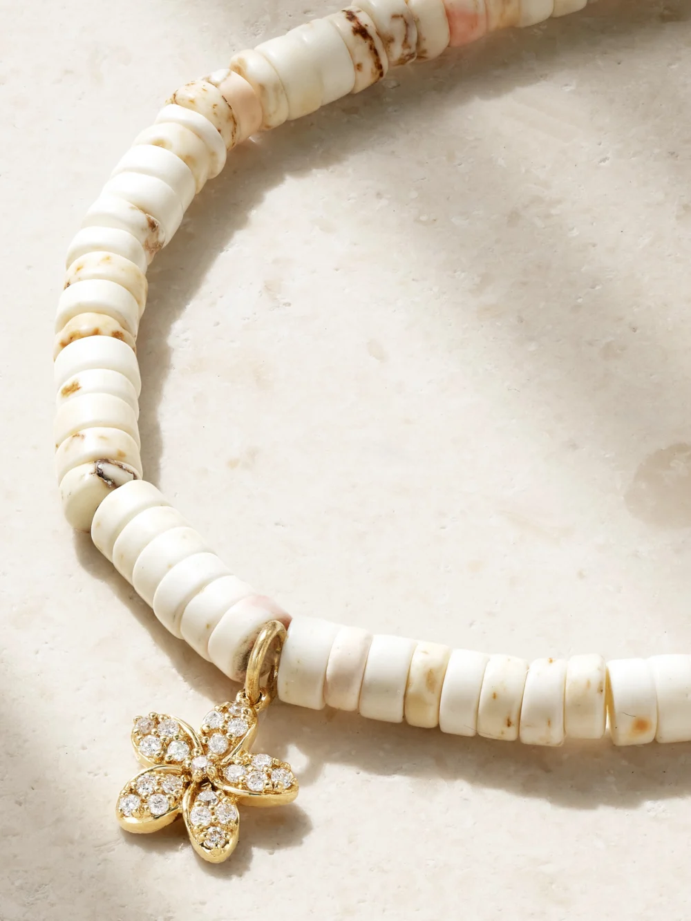 Close-up detail of the Sydney Evan Small Plumeria 14-karat Gold, Turquoise and Diamond Bracelet