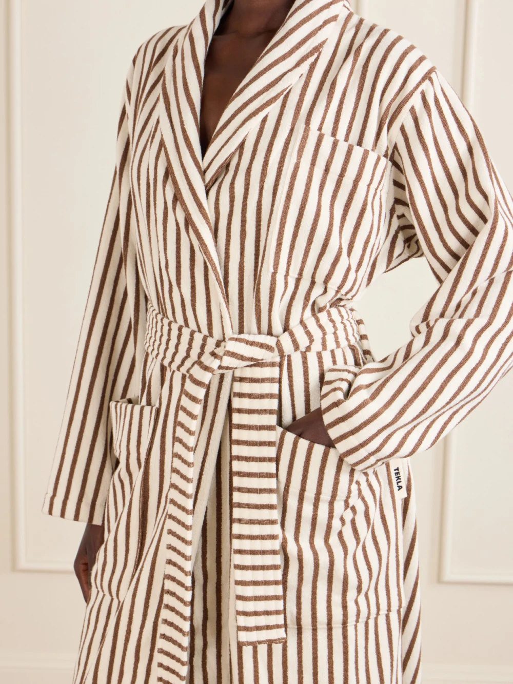 Close-up detail of the Tekla Belted Striped Organic Cotton-terry Robe