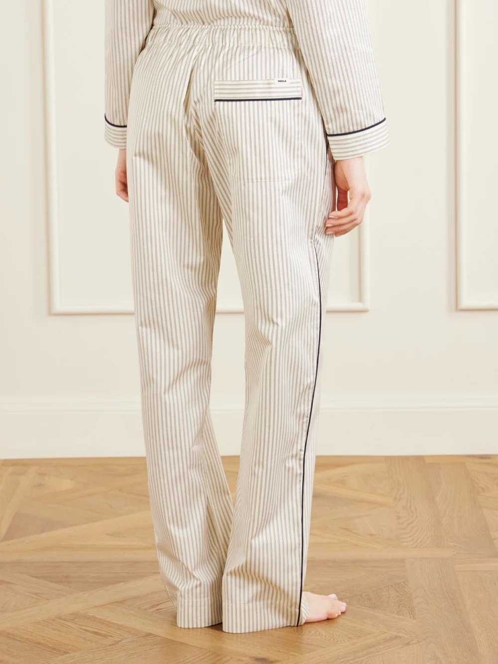 Back view of the Tekla Sateen Striped Organic Cotton-poplin Pajama Pants