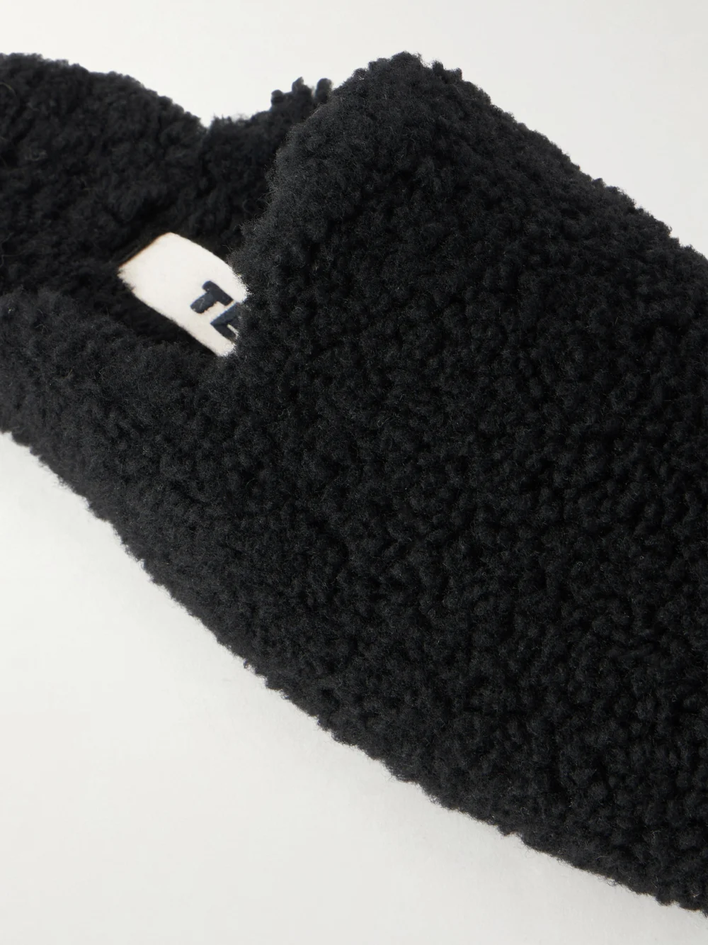Close-up detail of the Tekla Shearling Slippers