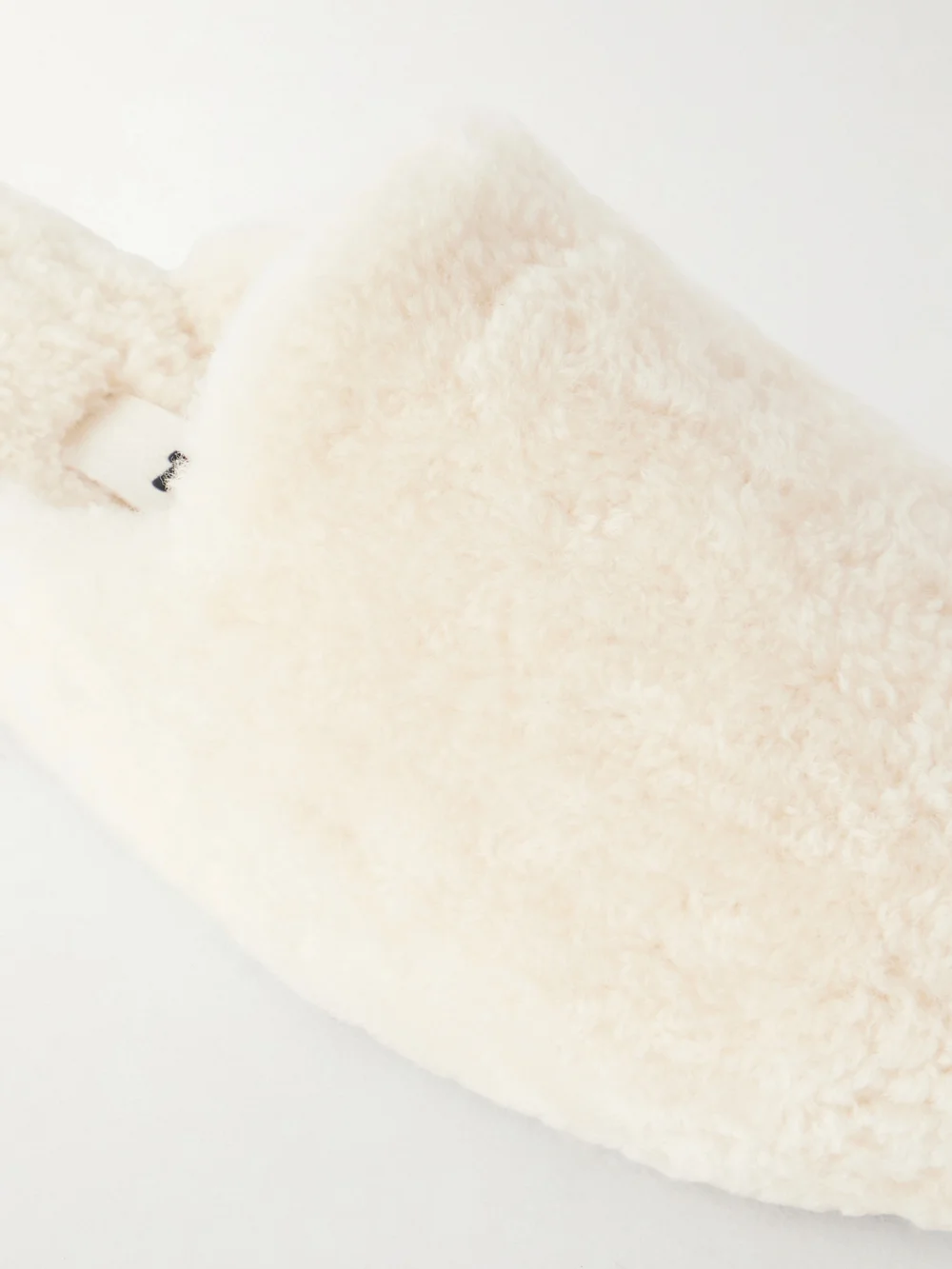 Close-up detail of the Tekla Shearling Slippers