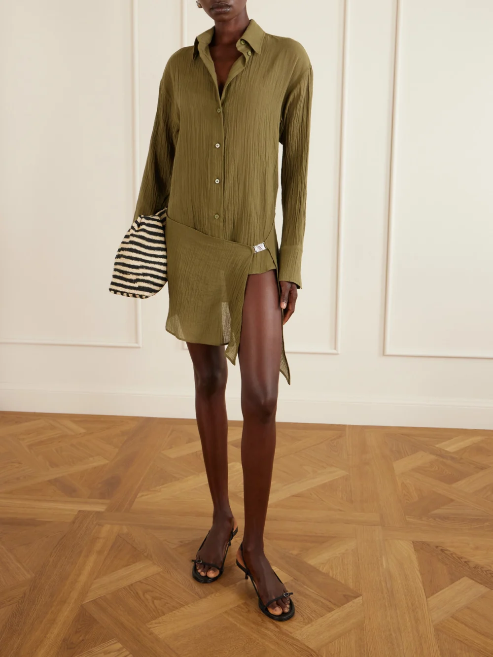 The Attico Asymmetric Cotton Mini Dress, worn by a model