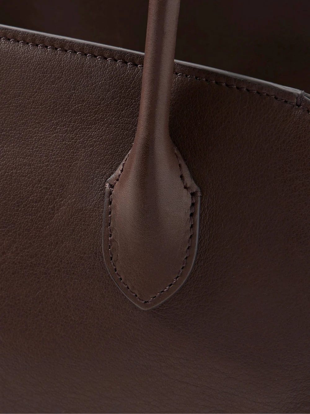 Close-up detail of The Row Marlo 12 Leather Tote