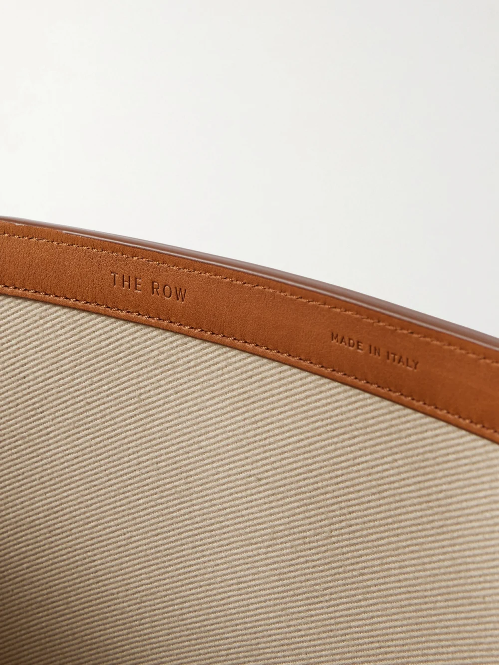 Close-up detail of The Row Park Reversible Leather-trimmed Twill Tote