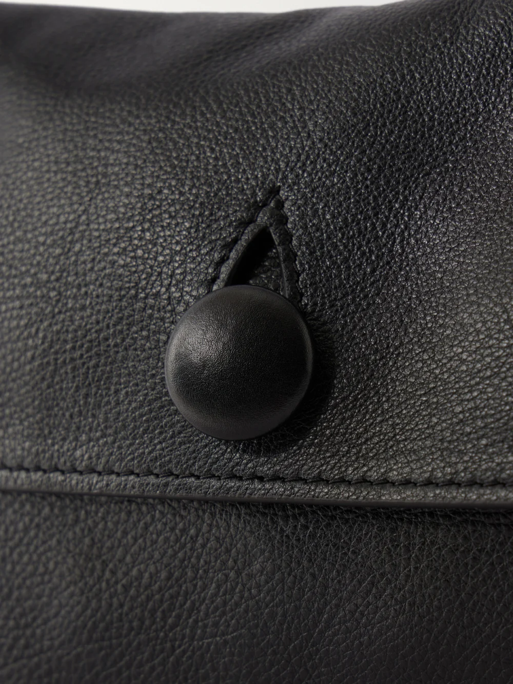 Close-up detail of The Row Sally Ody Leather Shoulder Bag