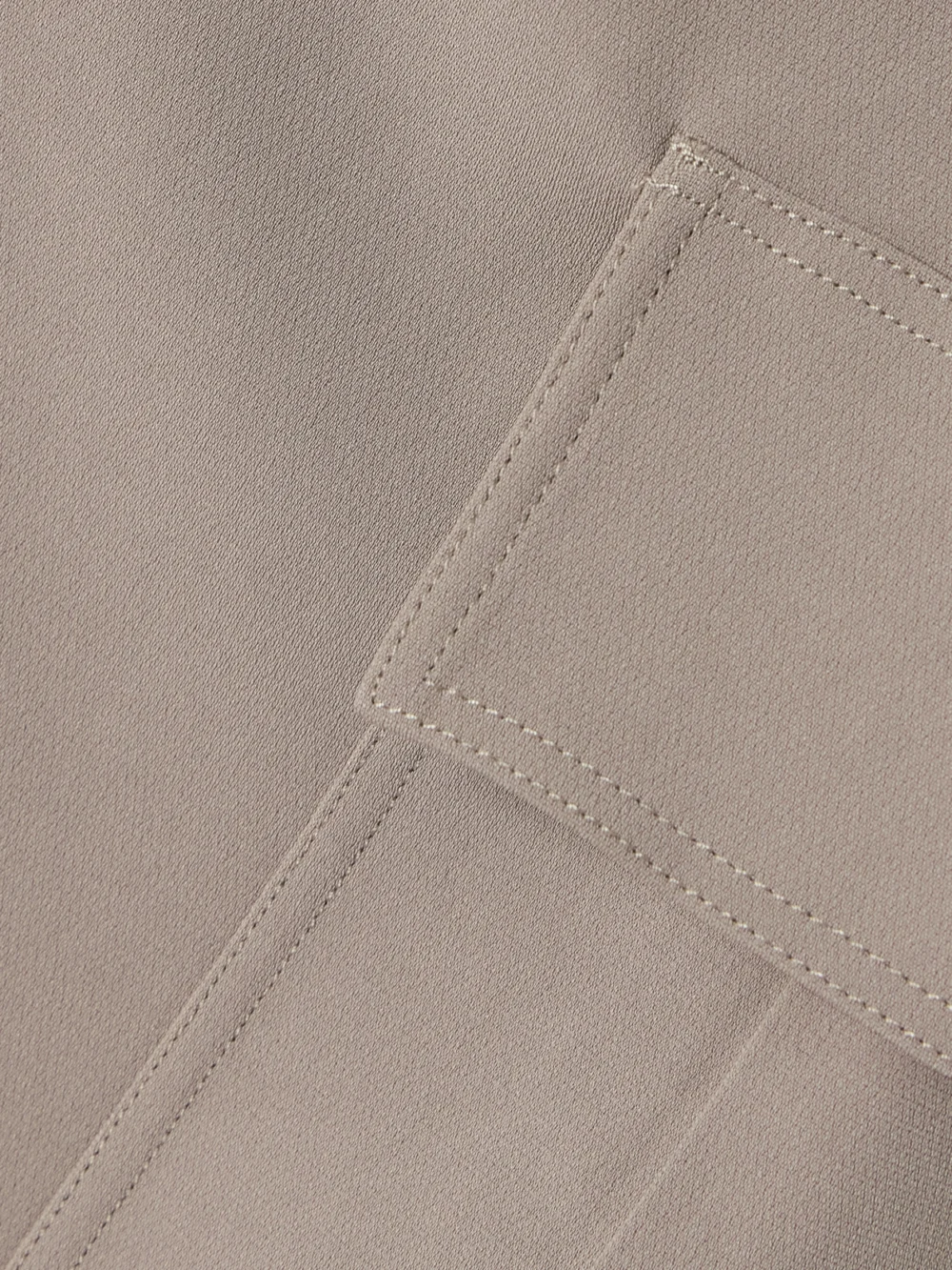 Close-up detail of the Theory Crepe Midi Skirt