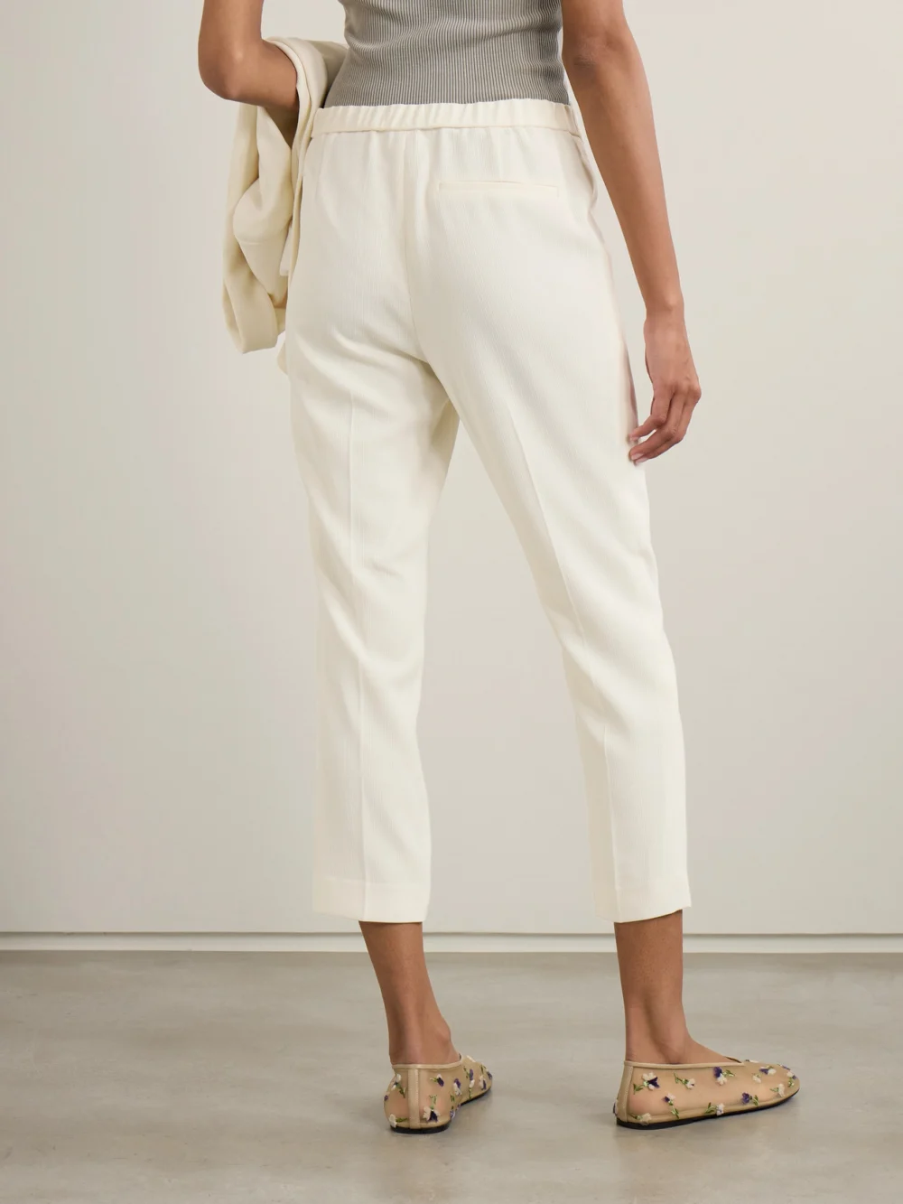 Back view of the Theory Treeca Cropped Plissé-crepe Straight-leg Pants