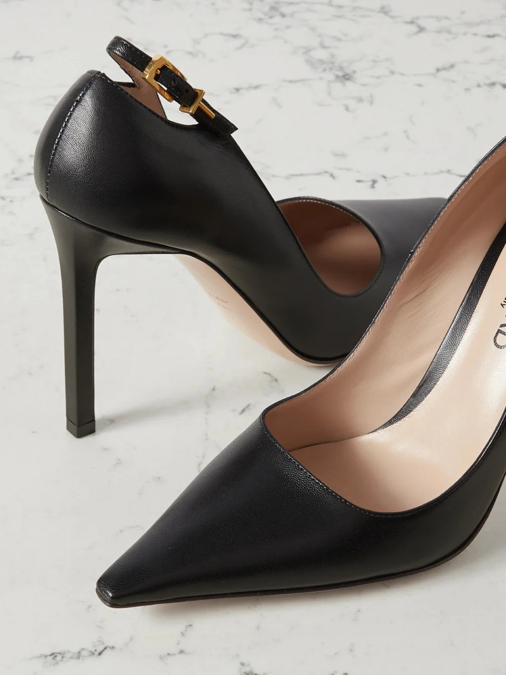 Close-up detail of the Tom Ford Angelina Cutout Buckle-detailed Leather Pumps