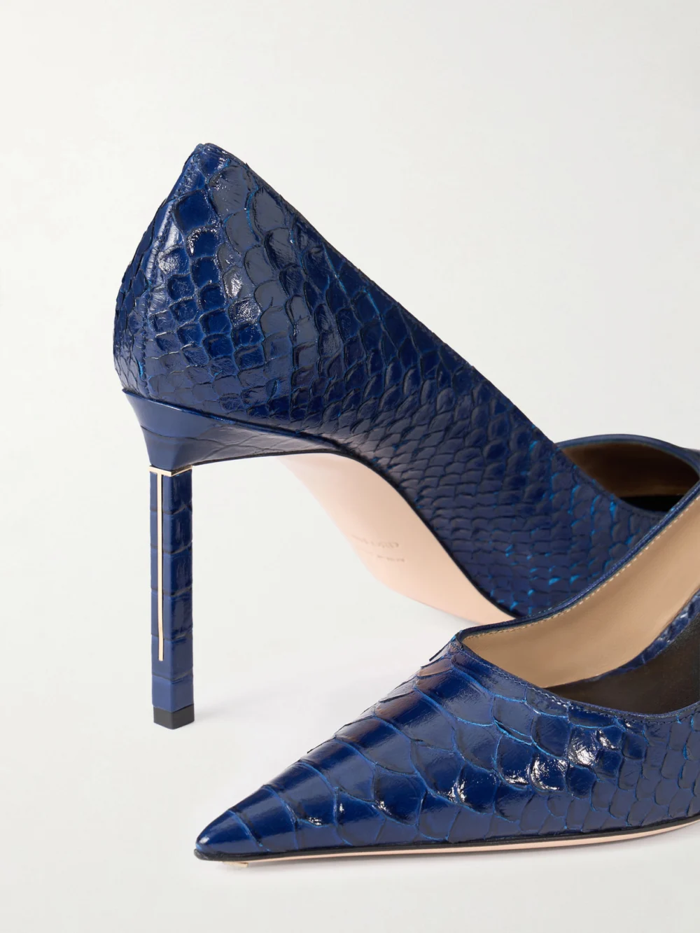 Close-up detail of the Tom Ford Snake-effect Leather Pumps