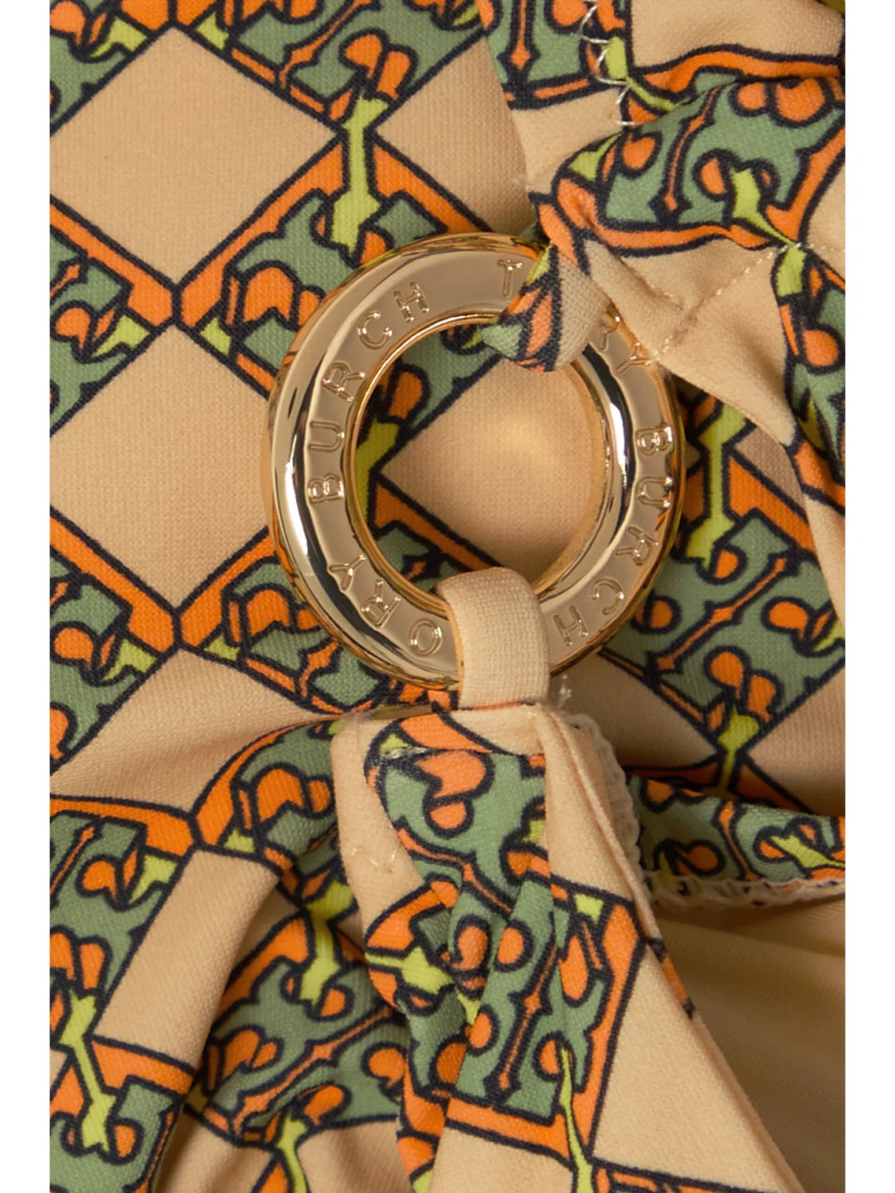 Close-up detail of the Tory Burch Embellished Printed Halterneck Swimsuit