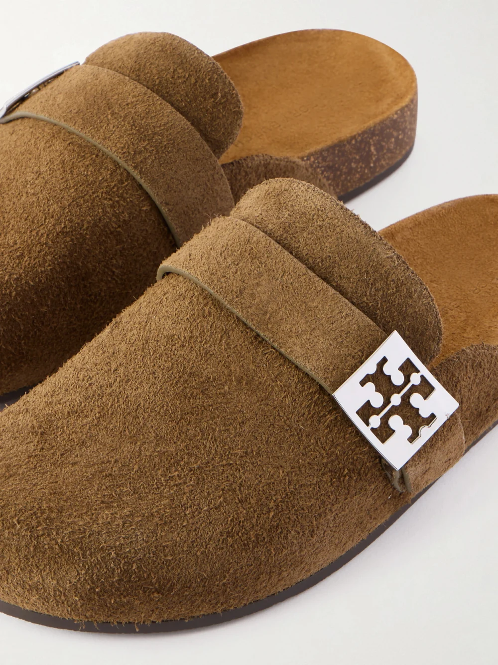 Close-up detail of the Tory Burch Mellow Embellished Suede Clogs