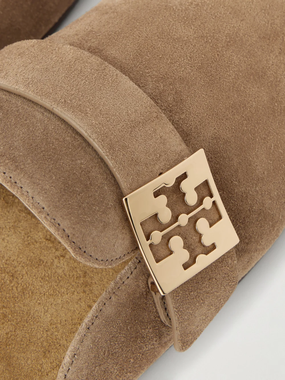 Close-up detail of the Tory Burch Mellow Embellished Suede Clogs