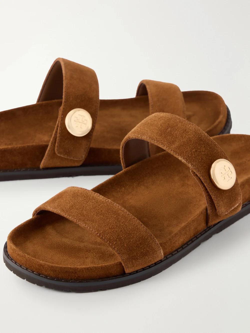 Close-up detail of the Tory Burch Romy Sport Embellished Suede Slides