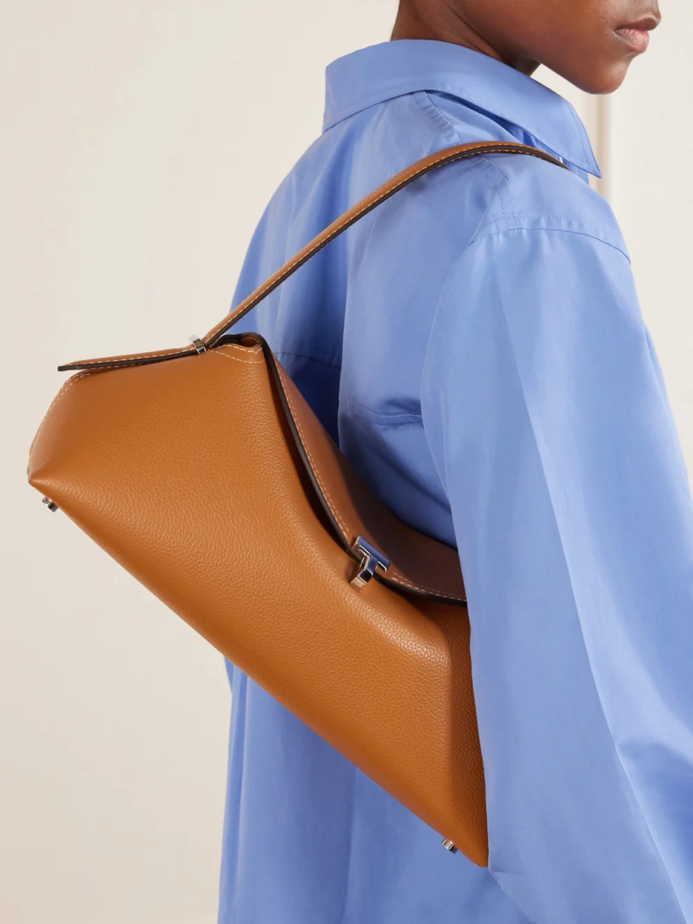 Totême T-lock Full-grain Leather Shoulder Bag, styled view