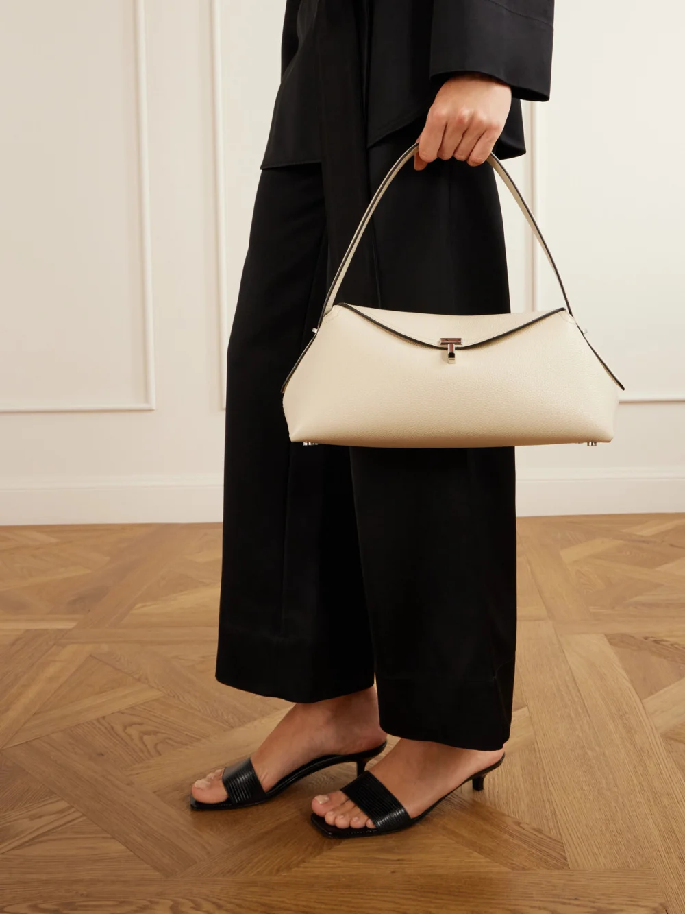 Totême T-lock Leather Shoulder Bag, styled view