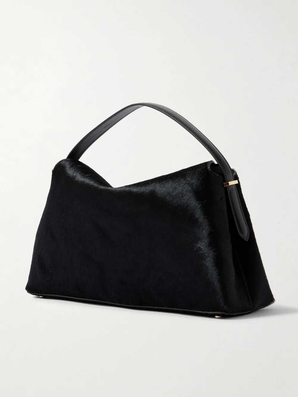 Back view of the Totême T-lock Leather-trimmed Pony Hair Shoulder Bag