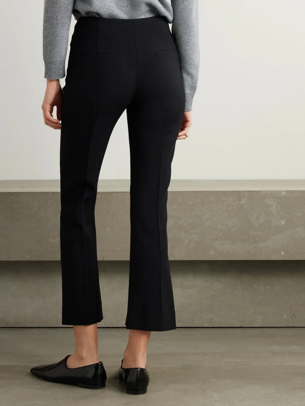 Back view of the Tove Talia Cropped Pleated Crepe Flared Pants