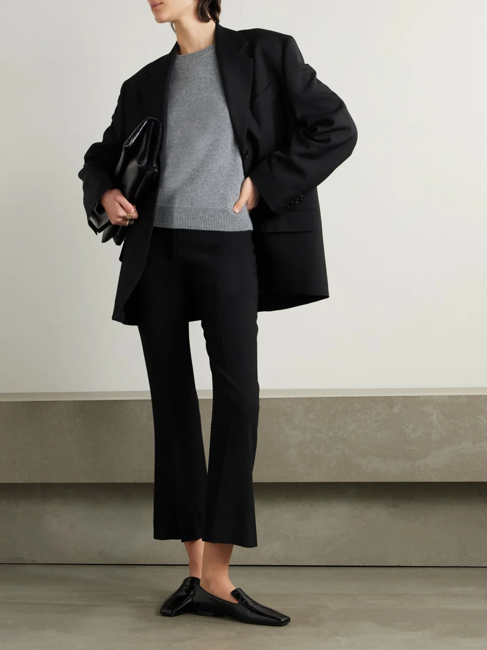 Tove Talia Cropped Pleated Crepe Flared Pants, worn by a model