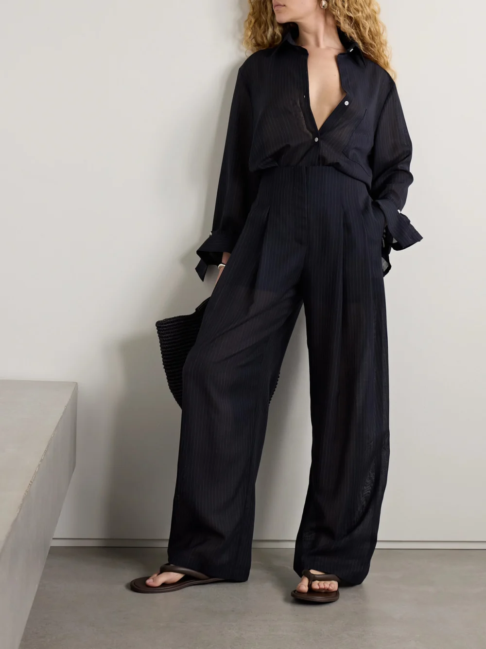 Twp Carrie's Pleated Pinstriped Wool Wide-leg Pants, worn by a model