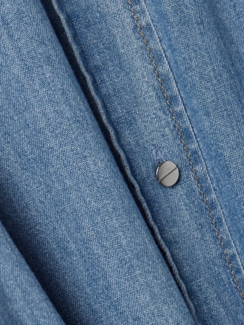 Close-up detail of the Twp Cowboy Cotton-chambray Maxi Shirt Dress