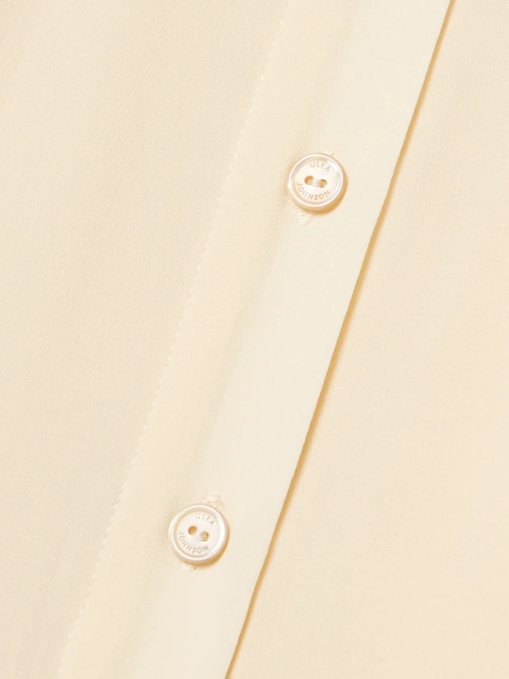 Close-up detail of the Ulla Johnson Silhouette Silk Crepe De Chine Midi Shirt Dress