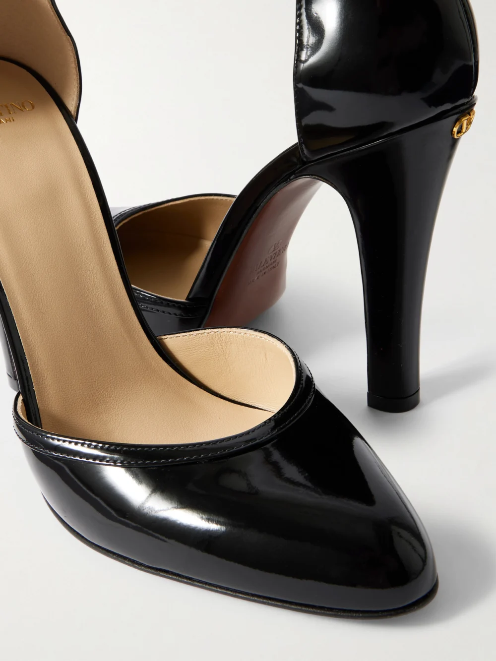 Close-up detail of the Valentino Garavani Hi Dolly Patent-leather Pumps