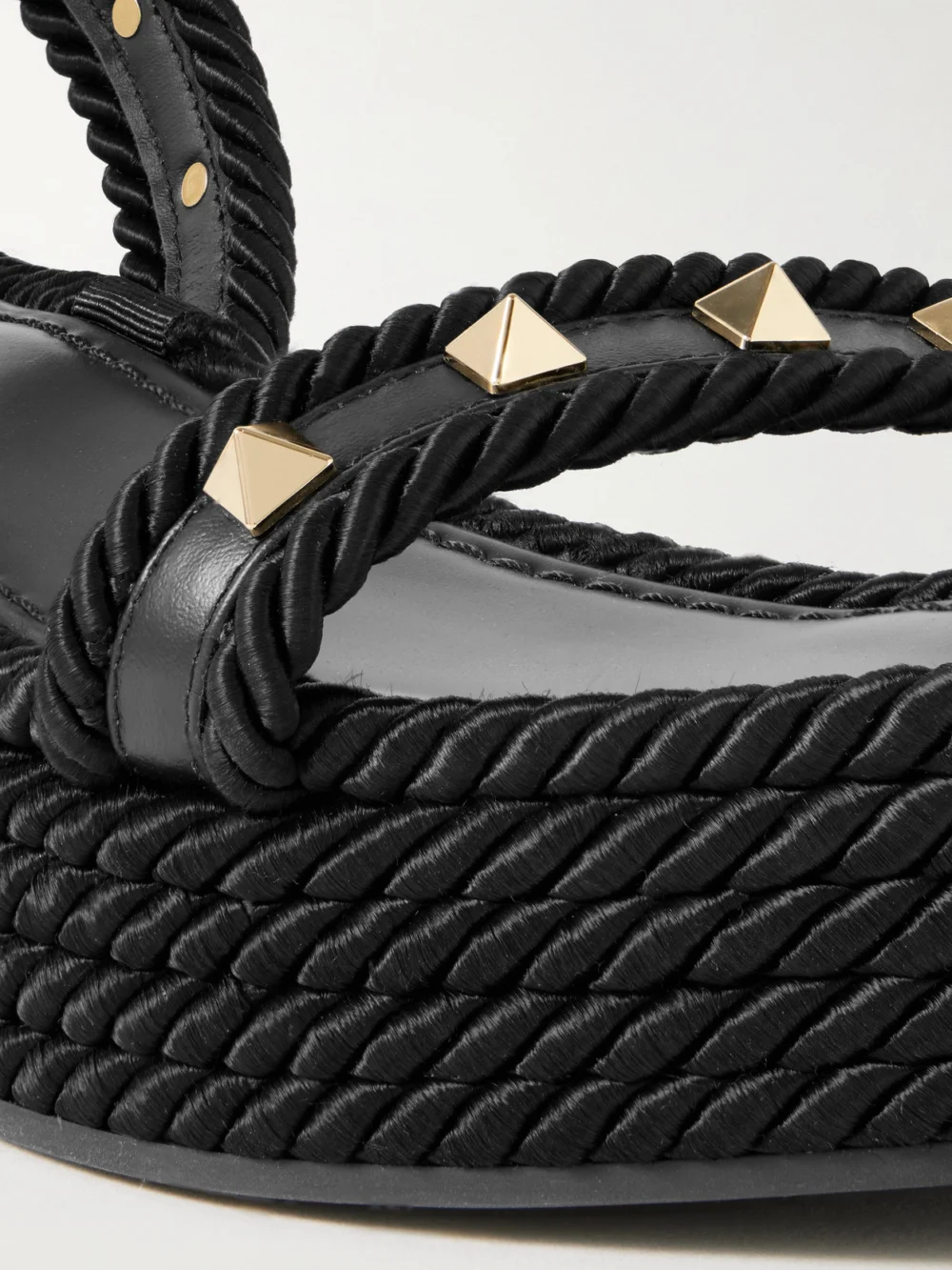 Close-up detail of the Valentino Garavani Rockstud Torchon 60 Leather and Silk Rope Platform Espadrilles